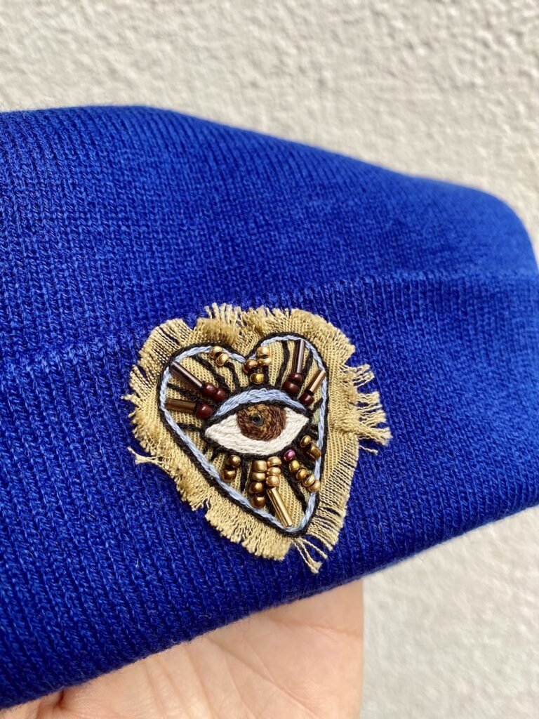 Royal-blue-beanie-heart-closeup
